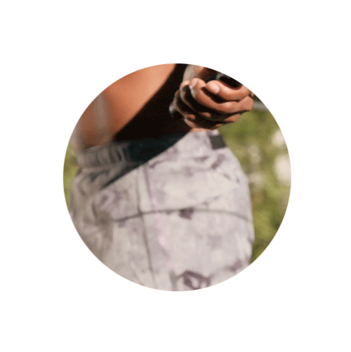 a man holding a Sweet Sweat® Light Weight Adjustable Length Cable Jump Rope in his hand.